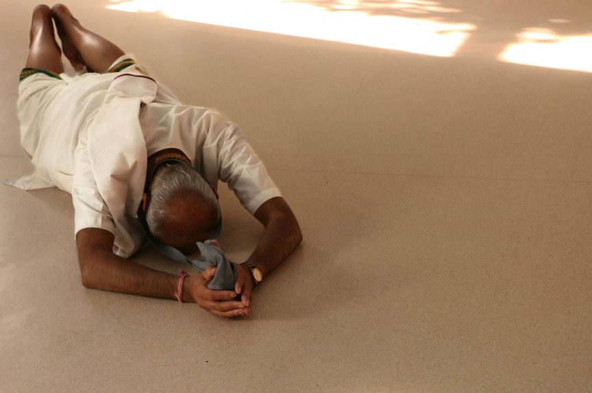 Nahib is a part-time priest for Iskon’s Hare Krishna temple. The temple is built in a back garden in East Croyden, where I met Selvan. “Its good we have bad weather, it means our heads are not here but dwelling on the next world”, Nahib tells the devotees during the Sunday puja. 