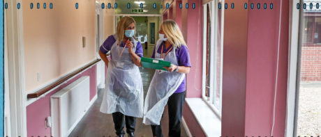 two care home workers wearing ppe