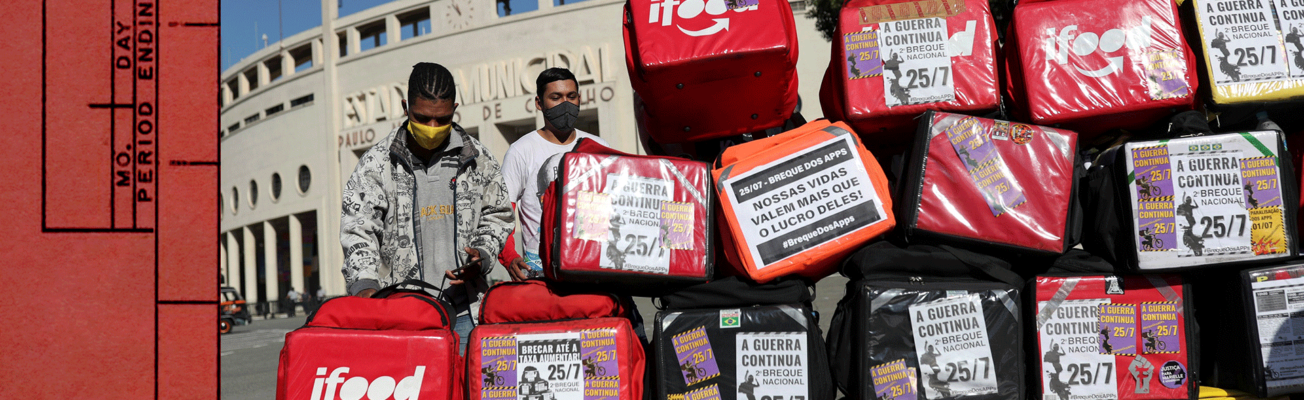 Courier riders stacking delivery containers.