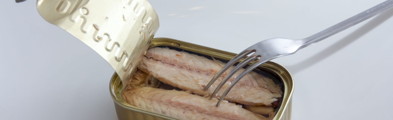 tin of mackerel with fork inside it