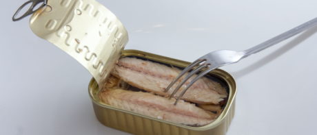 tin of mackerel with fork inside it