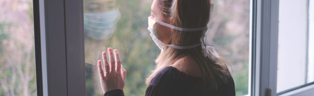 woman window coronavirus shielding shielder