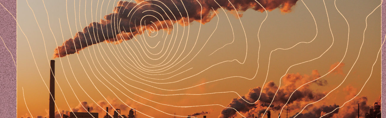 Streams of smoke coming out of an oil refinery at sunset