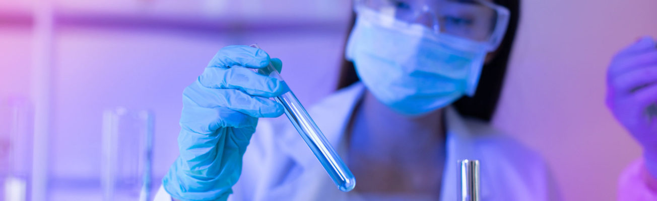 a scientist works on covid vaccine