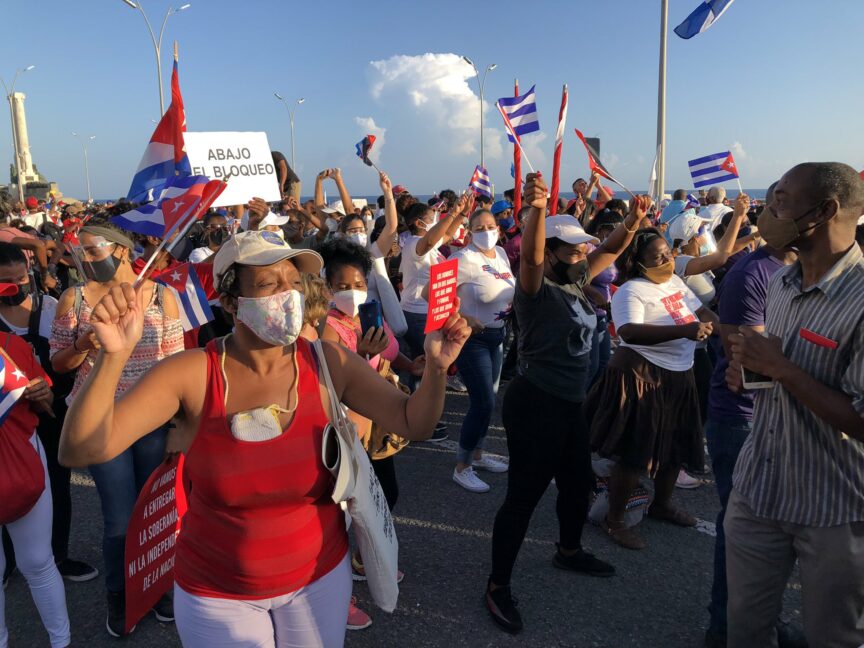 Cubans take part in a mass rally in defence of the Cuban Revolution and calling for an end to US sanctions