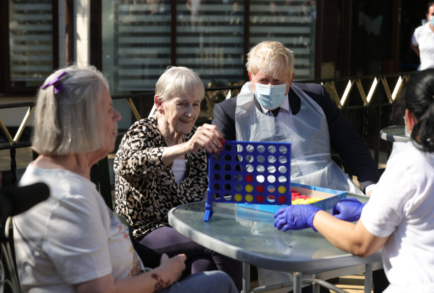 Boris Johnson and Rishi Sunak visit a care home in London. 