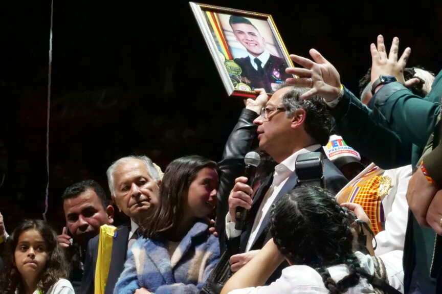 Dilan Cruz's mother holds an image of her son at Gustavo Petro's victory speech.