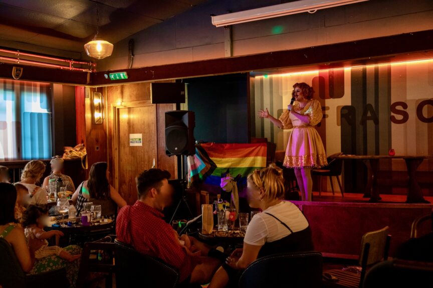 Flick performing at a drag show for parents. John Lubbock