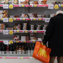 Clubcard branding is seen inside a branch of a Tesco supermarket in London. Reuters