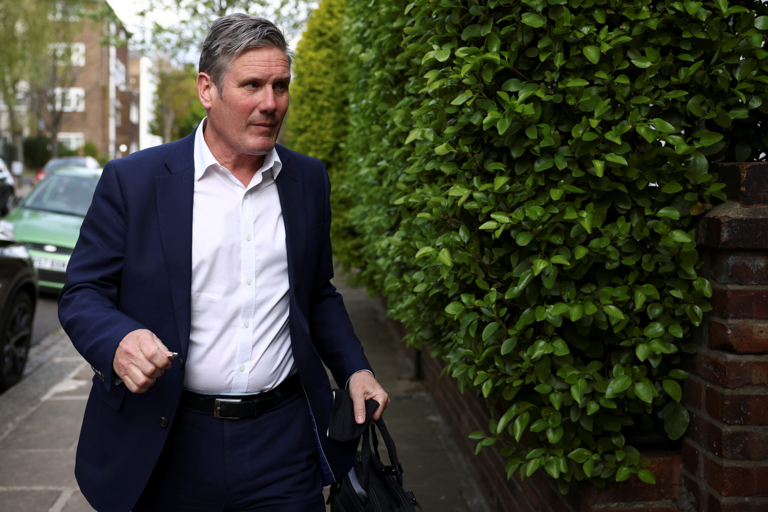 Keir Starmer arrives at his London home.