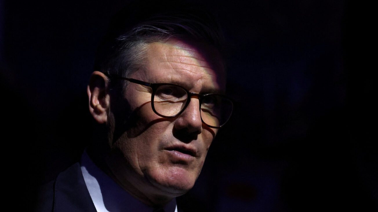 Keir Starmer, his face slightly in shadow