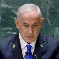 Benjamin Netanyahu speaks at podium