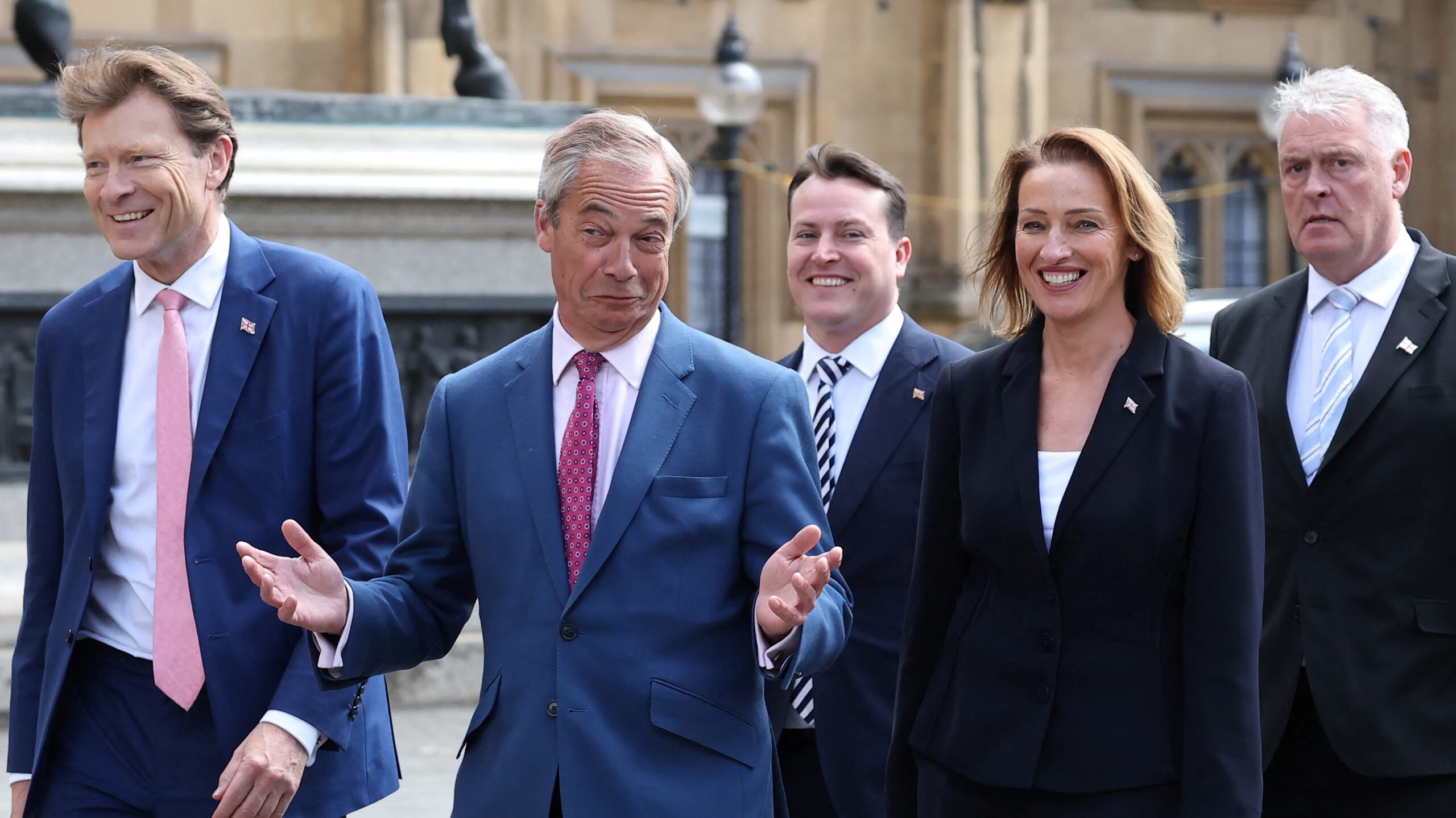 Reform party leader Nigel Farage and newly elected Reform MP Sarah Pochin, with fellow Reform MPs Richard Tice, James McMurdock and Lee Anderson, 6 May 2025. Toby Melville/Reuters