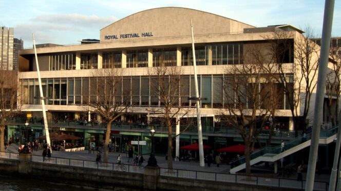 A large multi-story concert hall building pictured from the outside
