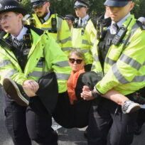 Saturday 6 September 2025, London, England: Police officers arrest a protester in Parliament Square who was holding a placard stating ‘I oppose genocide, I support Palestine Action’. Vuk Valcic/ZUMA Press Wire/Reuters