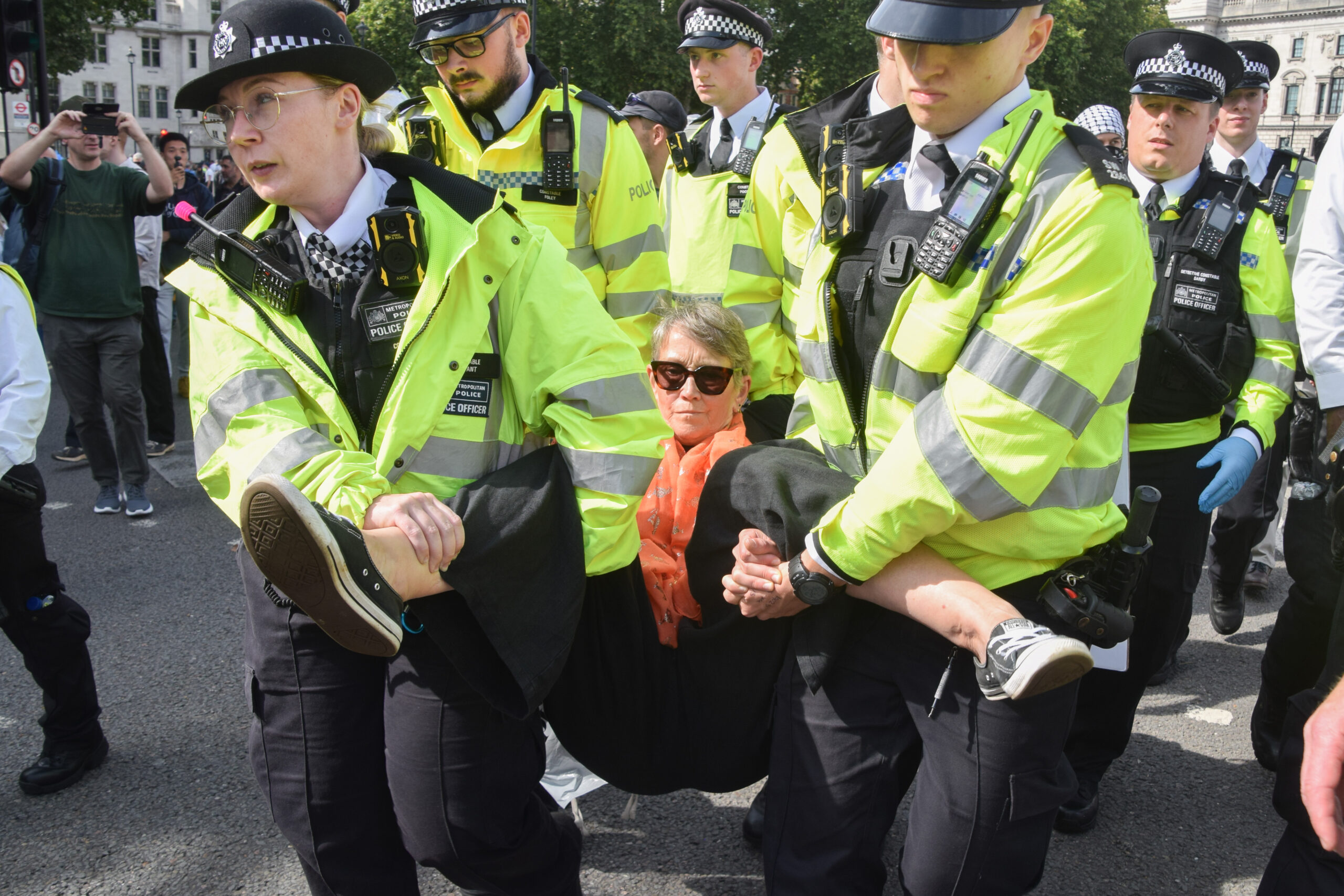 Saturday 6 September 2025, London, England: Police officers arrest a protester in Parliament Square who was holding a placard stating ‘I oppose genocide, I support Palestine Action’. Vuk Valcic/ZUMA Press Wire/Reuters