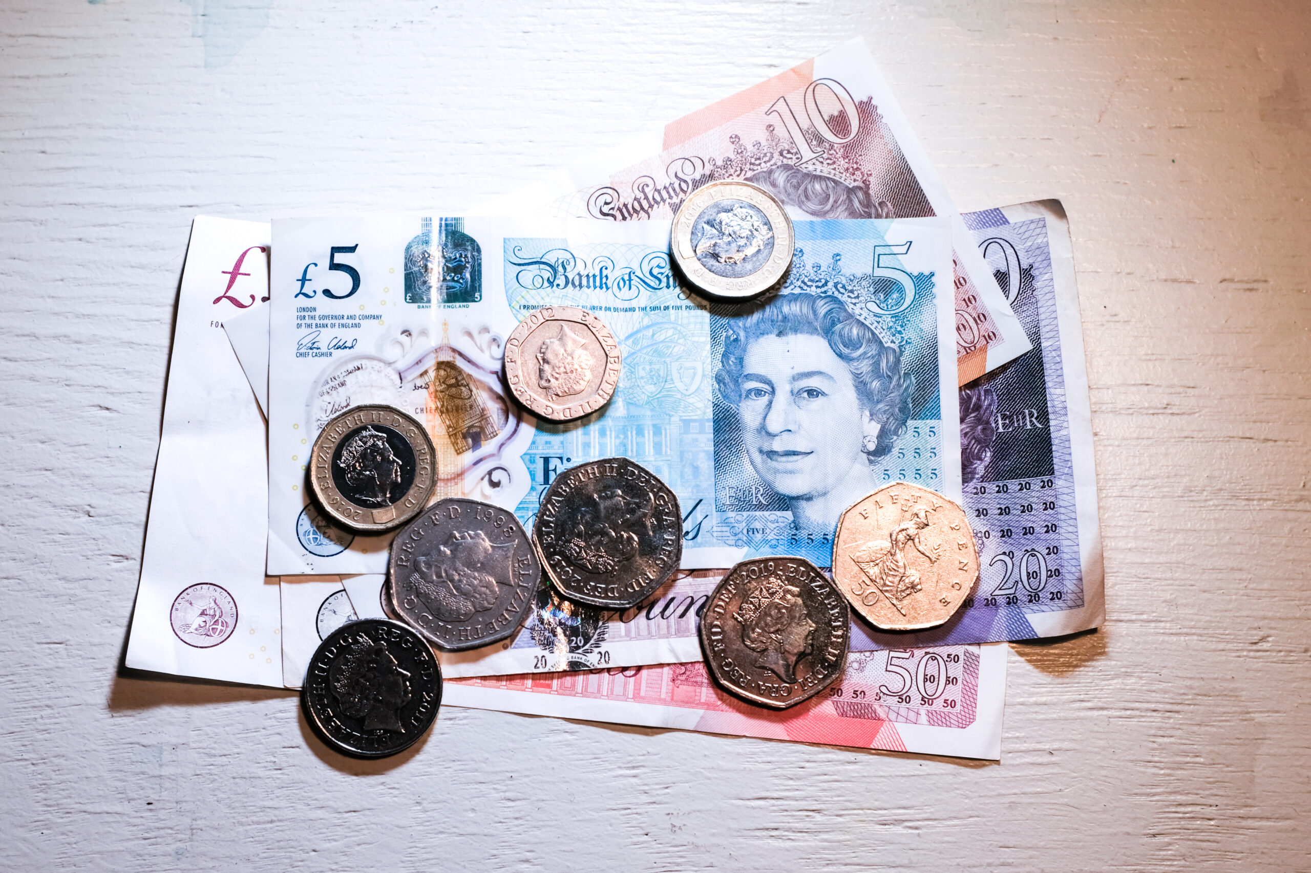 British Pound sterling bank notes and coins. Alberto Pezzali/NurPhoto/Reuters