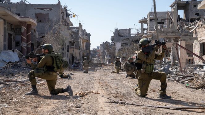 Israel Defense Forces (IDF) troops’ ground operation in Gaza on 12 November 2023. IDF handout/Reuters