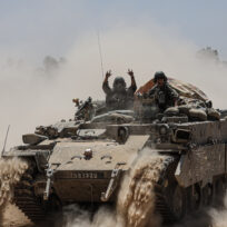 An Israeli army tank deploys at Israel’s southern border with the Gaza Strip. Saeed Qaq/ZUMA Press Wire/Reuters