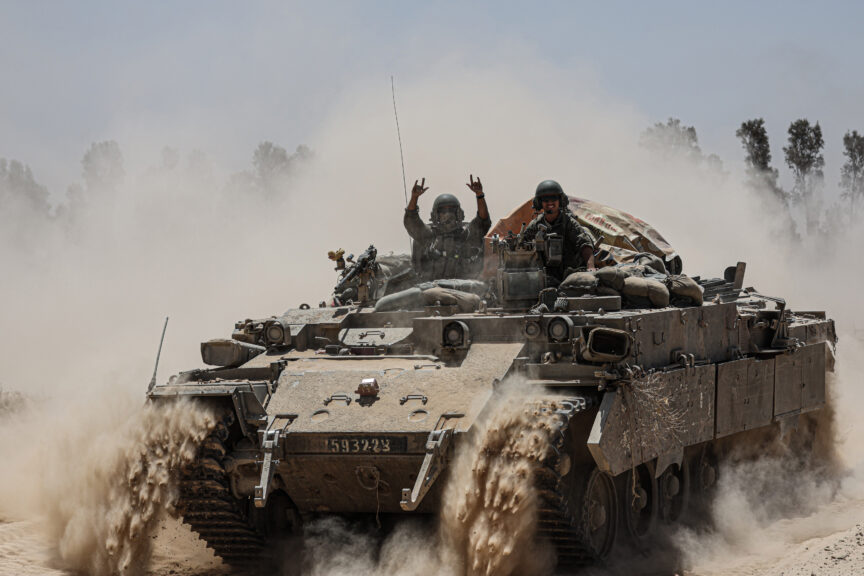 An Israeli army tank deploys at Israel’s southern border with the Gaza Strip. Saeed Qaq/ZUMA Press Wire/Reuters