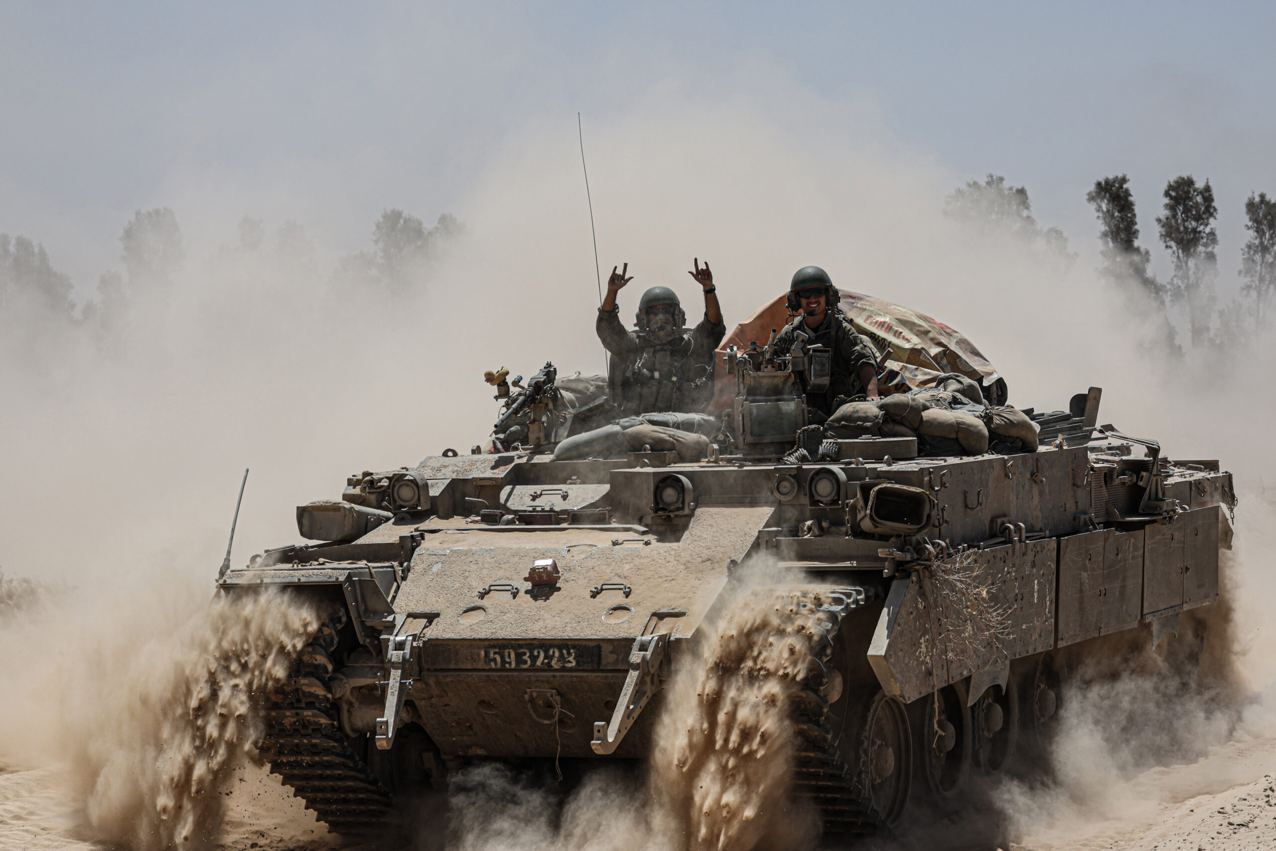 An Israeli army tank deploys at Israel’s southern border with the Gaza Strip. Saeed Qaq/ZUMA Press Wire/Reuters
