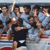 Freed Palestinian prisoners released by Israel as part of a hostages-prisoners swap and a ceasefire deal between Hamas and Israel, gesture, in Khan Younis in the southern Gaza Strip, October 13, 2025.