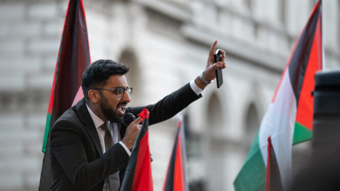 Independent MP for Blackburn Adnan Hussain seen addressing the crowd during a pro-Palestine demonstration outside Downing Street in London, 11 September 2024. SOPA Images / Reuters