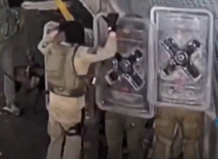 A still from the leaked video of IDF reservists allegedly gang-raping a Palestinian prisoner.