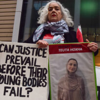A protester holds a picture of Teuta ‘T’ Hoxha during a demonstration outside the Department of Health in solidarity with pro-Palestine activists who are on hunger strike in prison, 17 December 2025, London, England. Vuk Valcic/ZUMA Press Wire