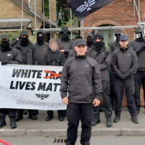 Neo-Nazi group White Vanguard pose for a photograph