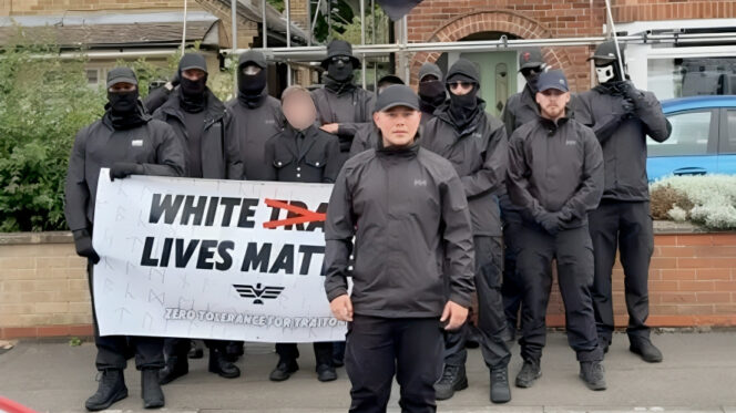Neo-Nazi group White Vanguard pose for a photograph