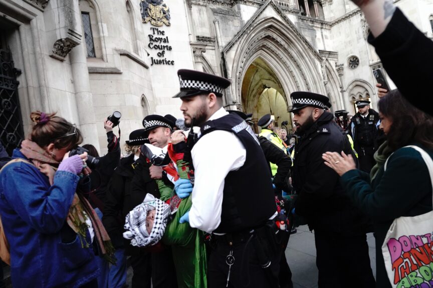 Police arrest a protester in London as the Judicial Review challenging the proscription of Palestine Action gets underway in November. Photo: Joao Daniel Pereira/Sipa USA
