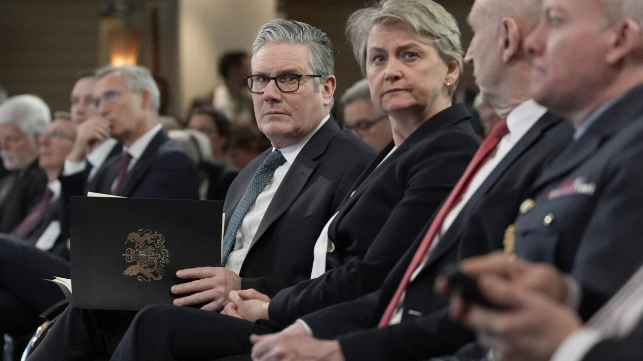Yvette Cooper sits with prime minister Keir Starmer