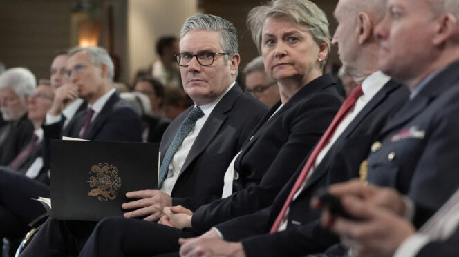 Yvette Cooper sits with prime minister Keir Starmer