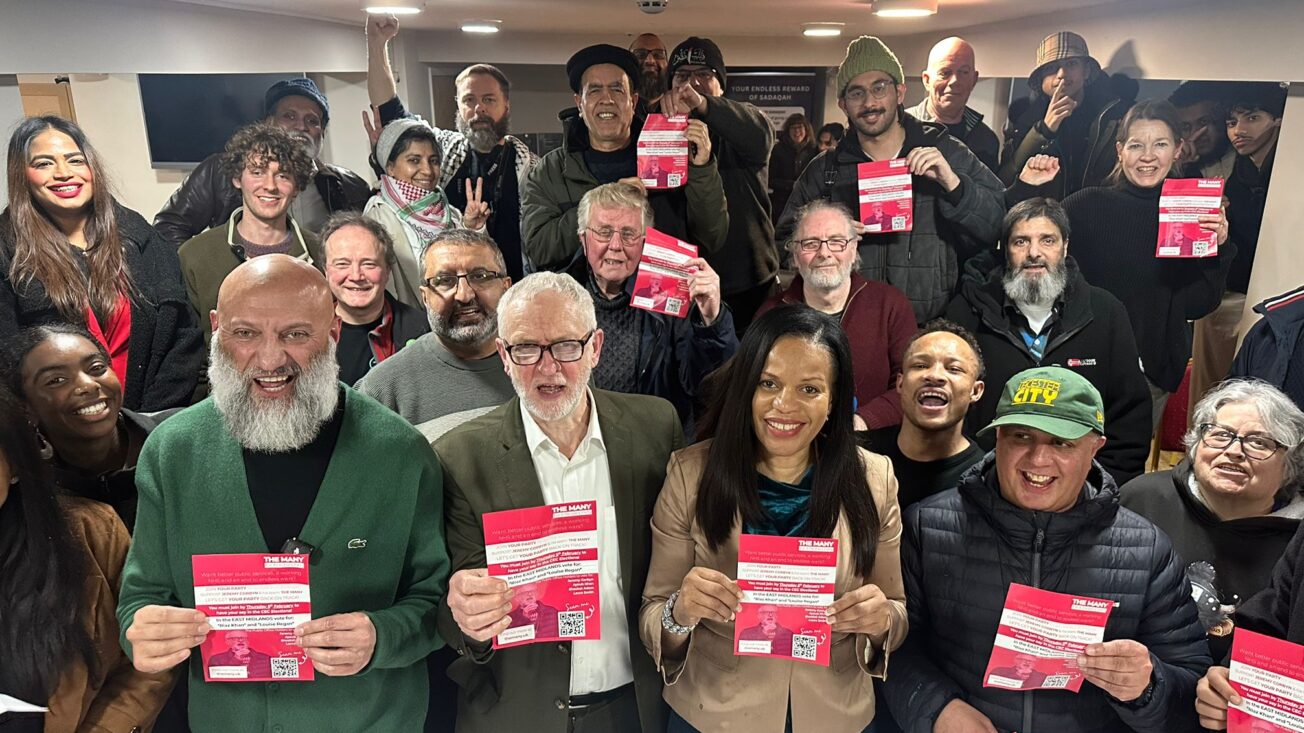 Jeremy Corbyn (C) with The Many's East Midlands candidate Riaz Khan (L)