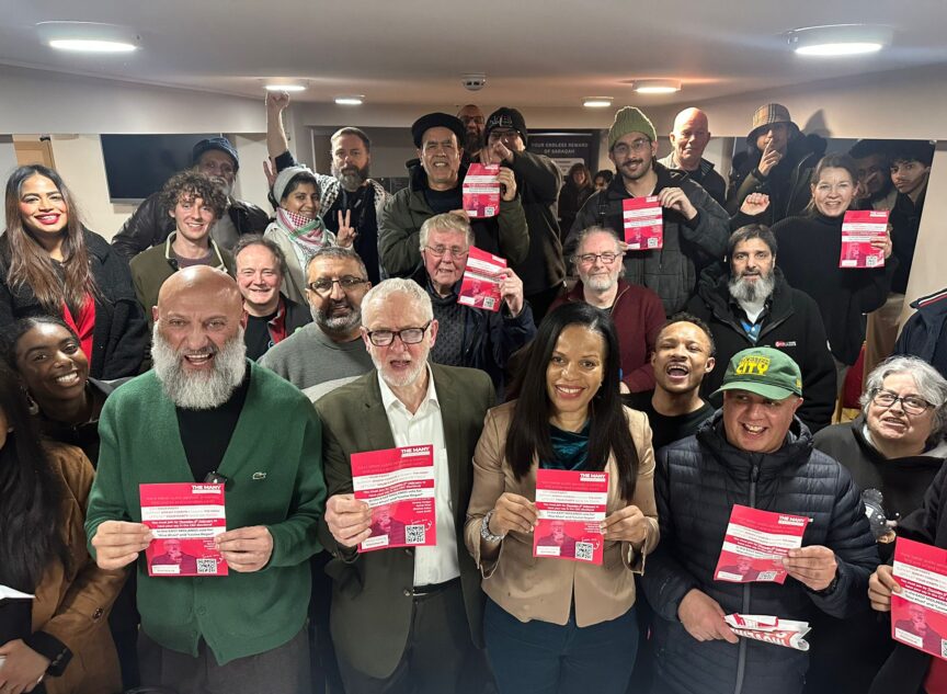 Jeremy Corbyn (C) with The Many's East Midlands candidate Riaz Khan (L)