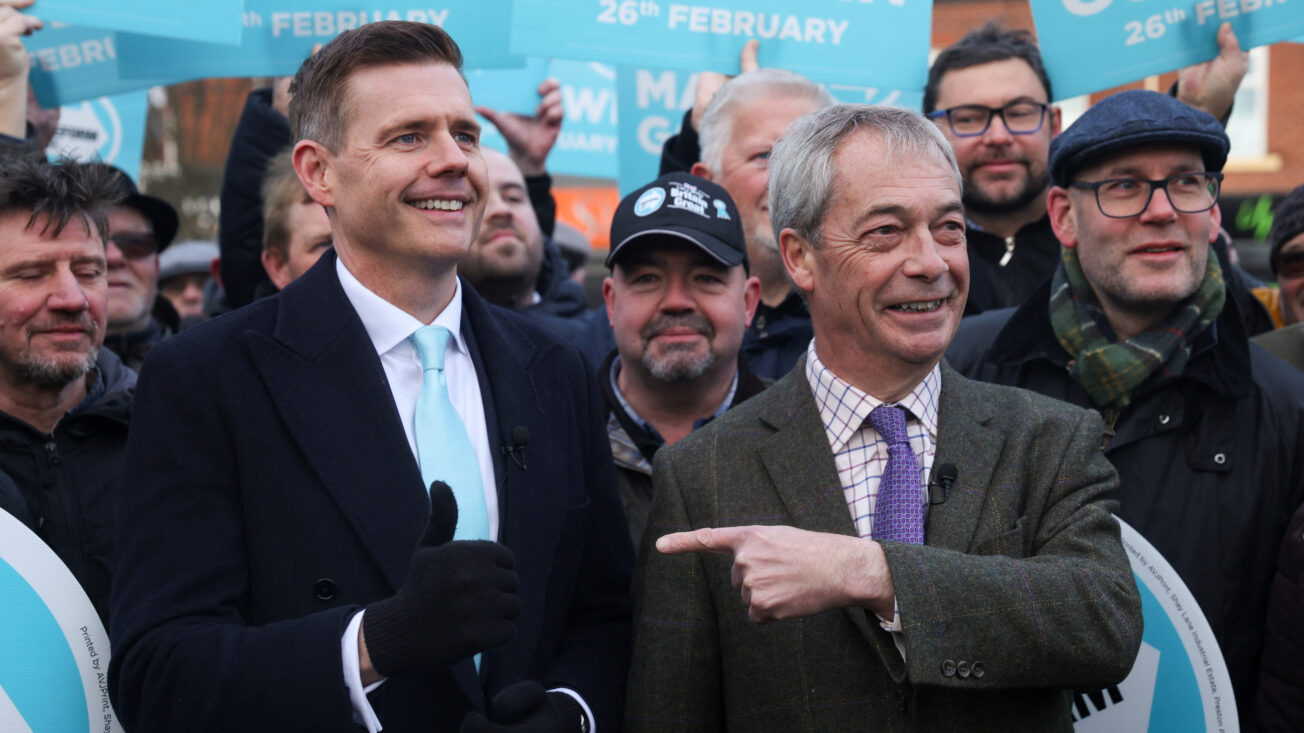 Matthew Goodwin and Nigel Farage campaigning in Denton in January. REUTERS/Temilade Adelaja