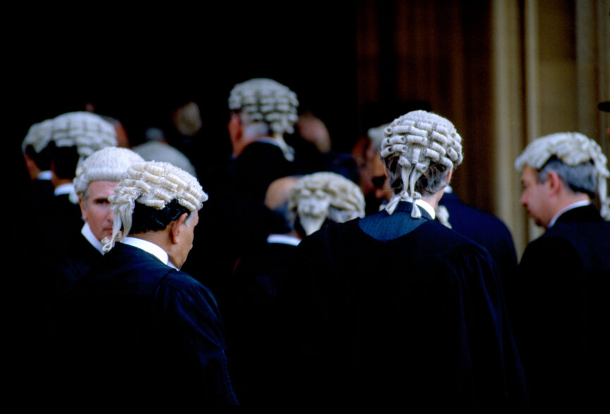A stock photo of barristers wearing wigs and gowns