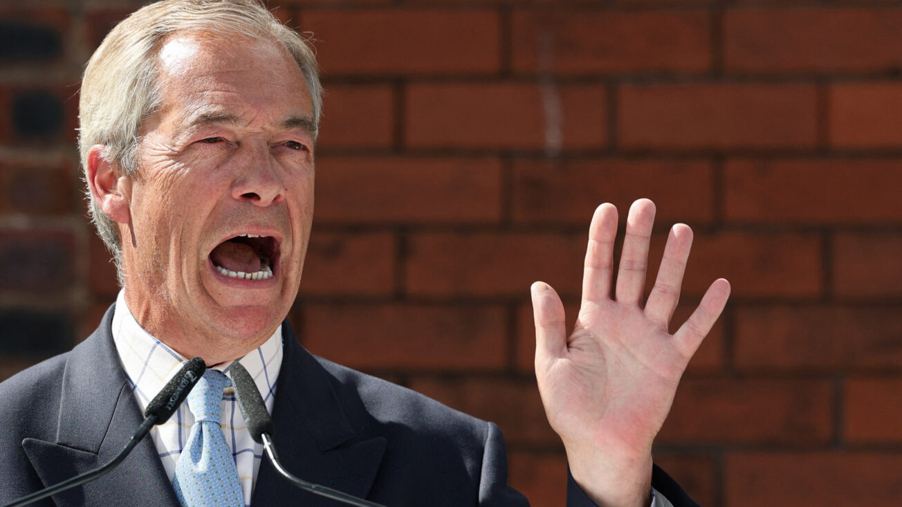 Nigel Farage speaks at a conference in Makerfield. Photo: Reuters/Temilade Adelaja