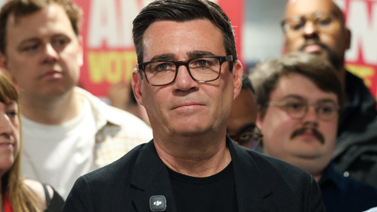 Dark-haired man with glasses