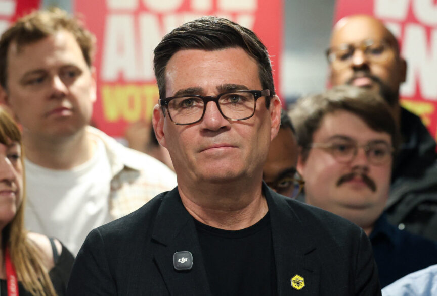 Dark-haired man with glasses