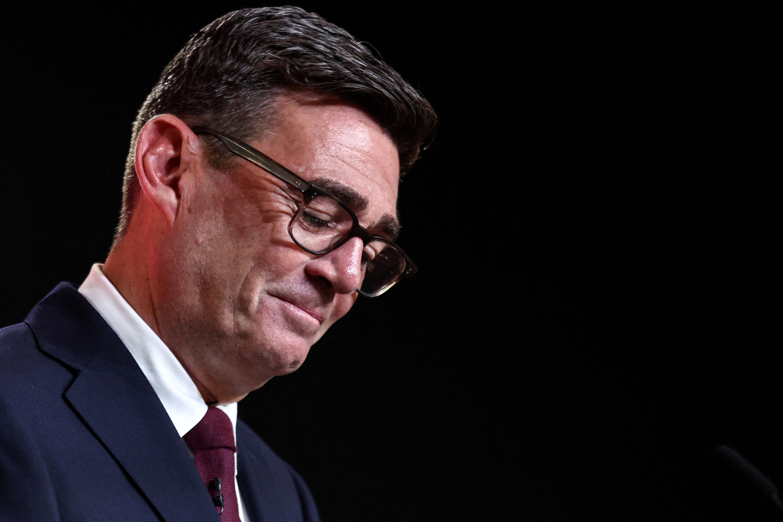 Andy Burnham looking down