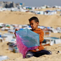 Palestinian boy with a paper kite
