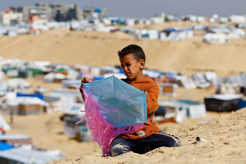 Palestinian boy with a paper kite