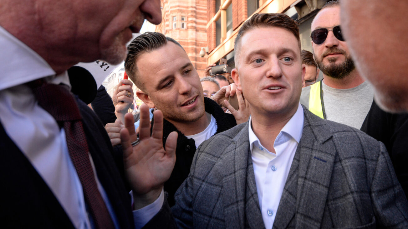 Danny Tommo at Tommy Robinson's right hand outside the Old Bailey in 2018. Photo: Avpics