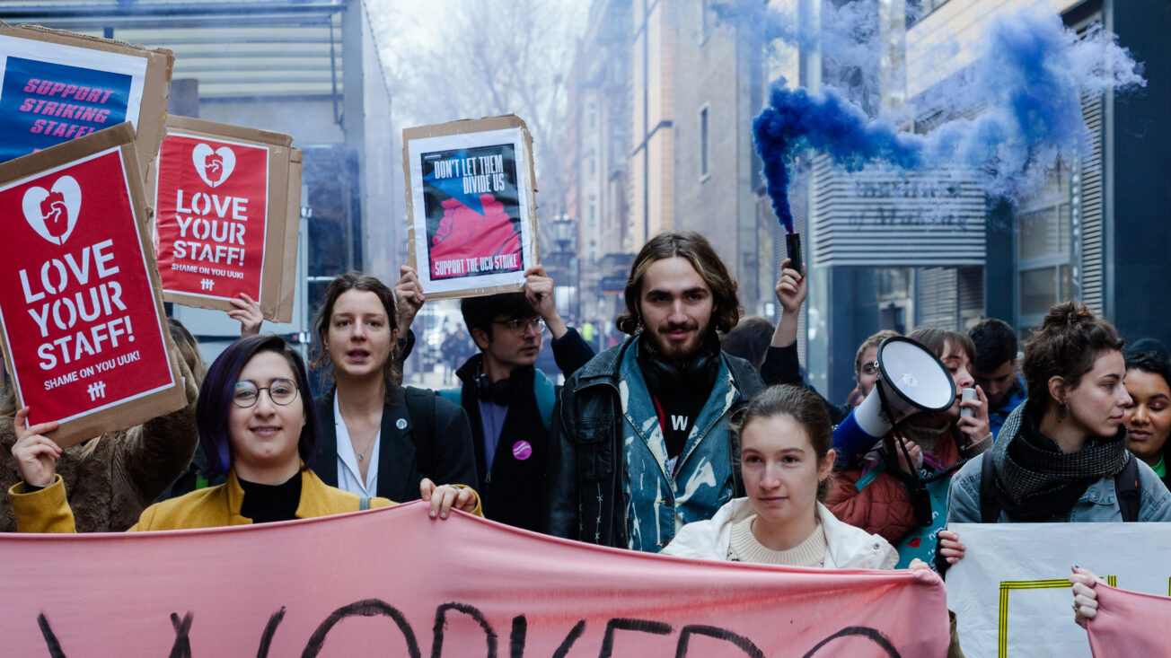 higher education staff and student take part in a protest march