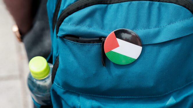 Backpack with a Palestine flag badge
