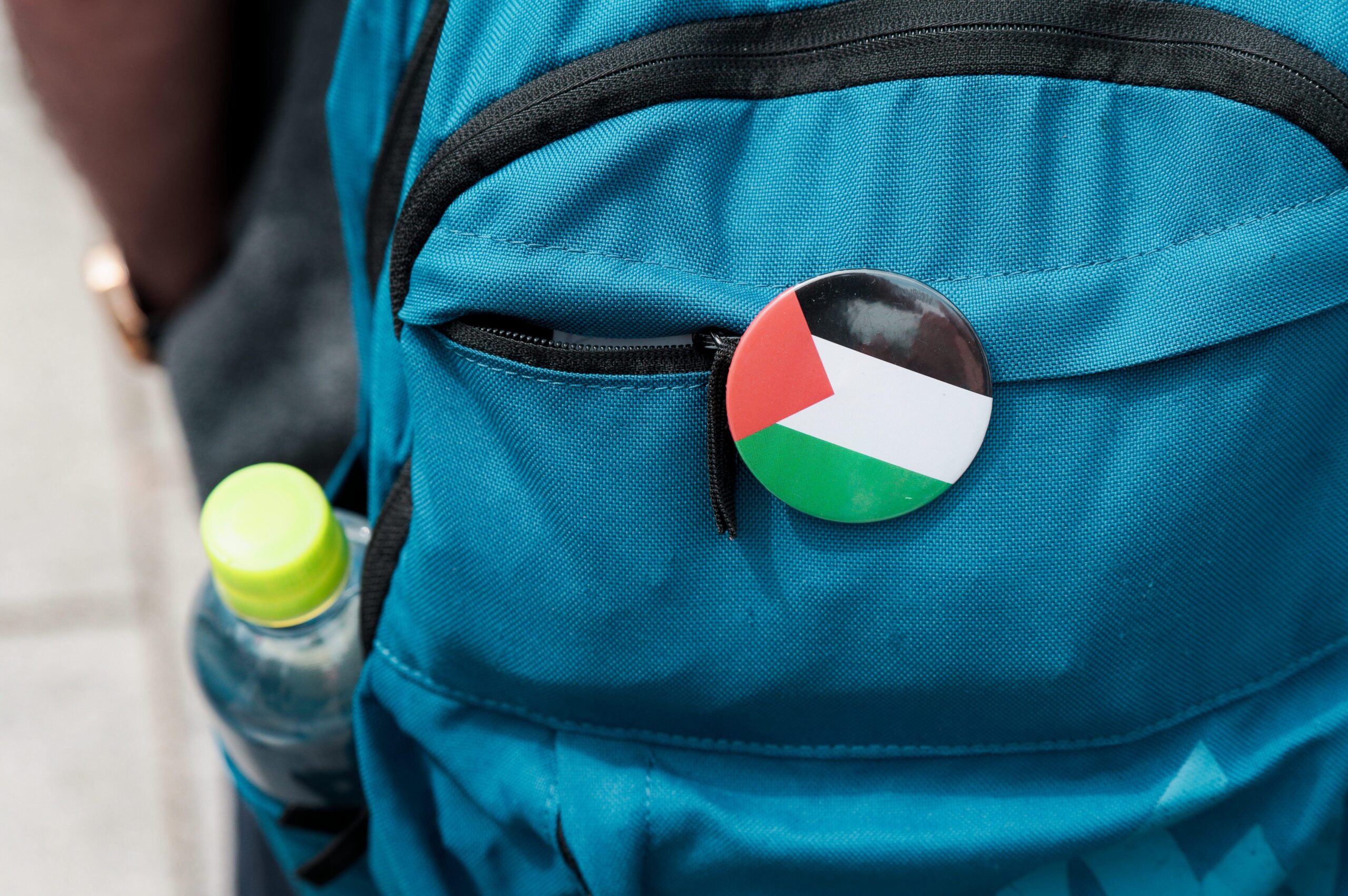 Backpack with a Palestine flag badge